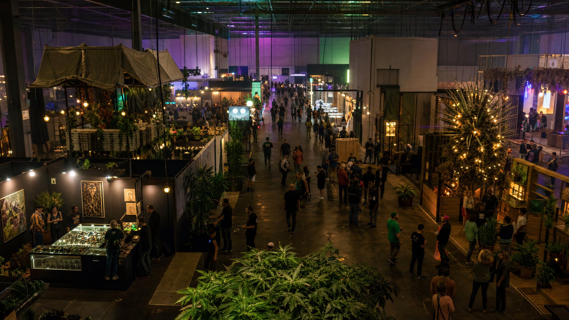 Editorial illustration of a trade fair hall with rows of booths and conference signage.