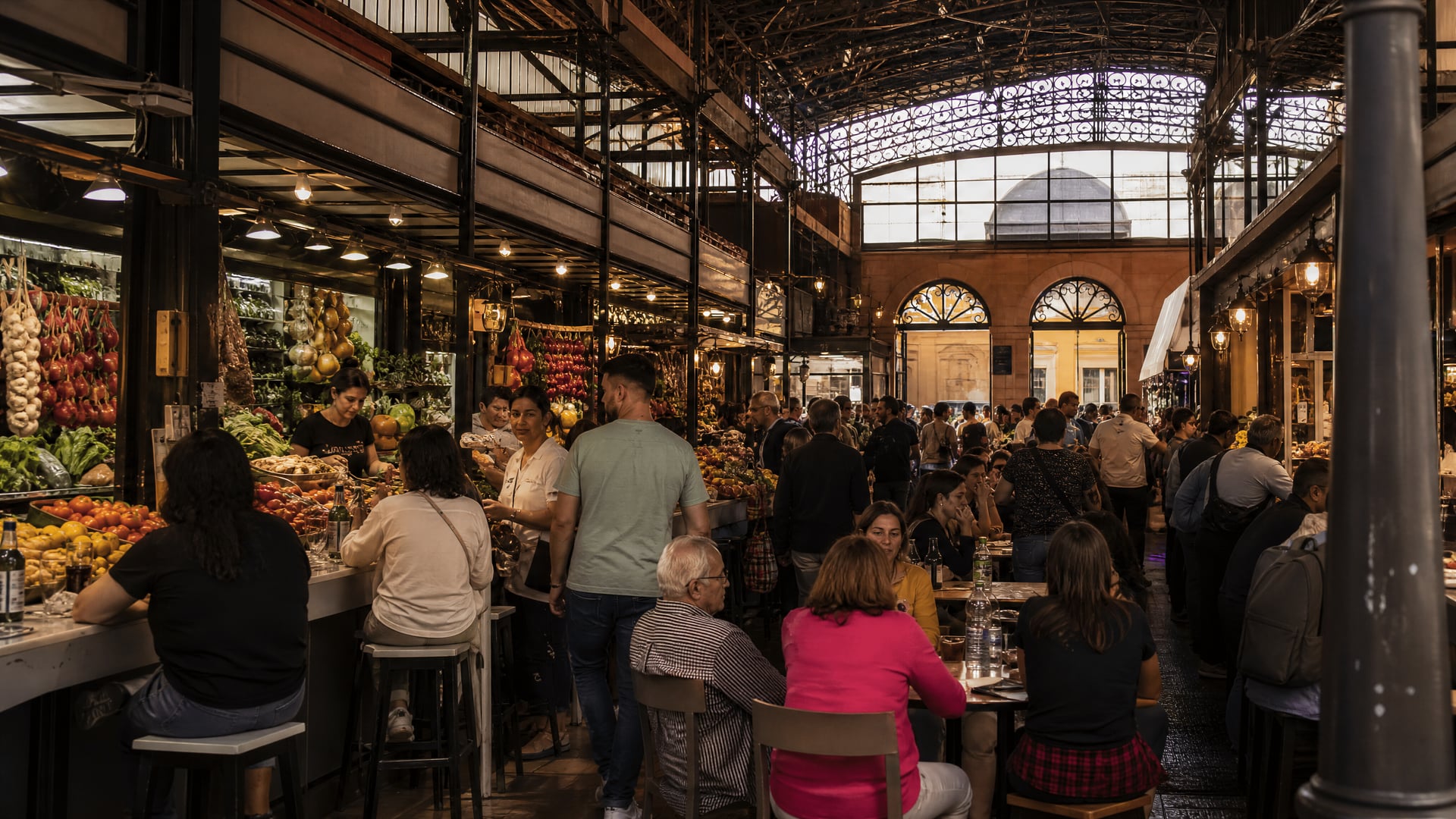 Seville market plaza with local street life and cannabis club neighborhood context
