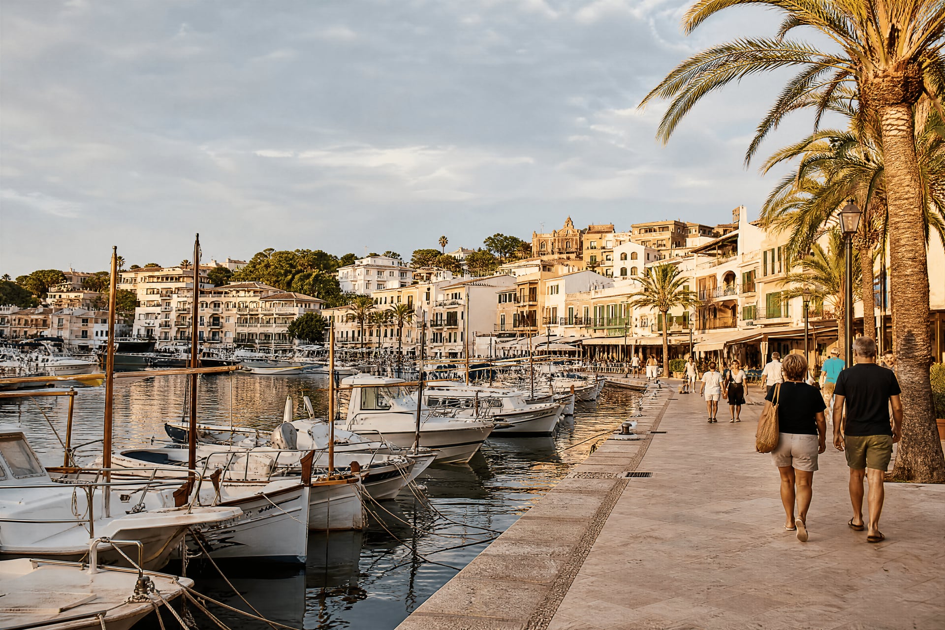 Porto Cristo harbourfront with cannabis social club context and everyday seaside life