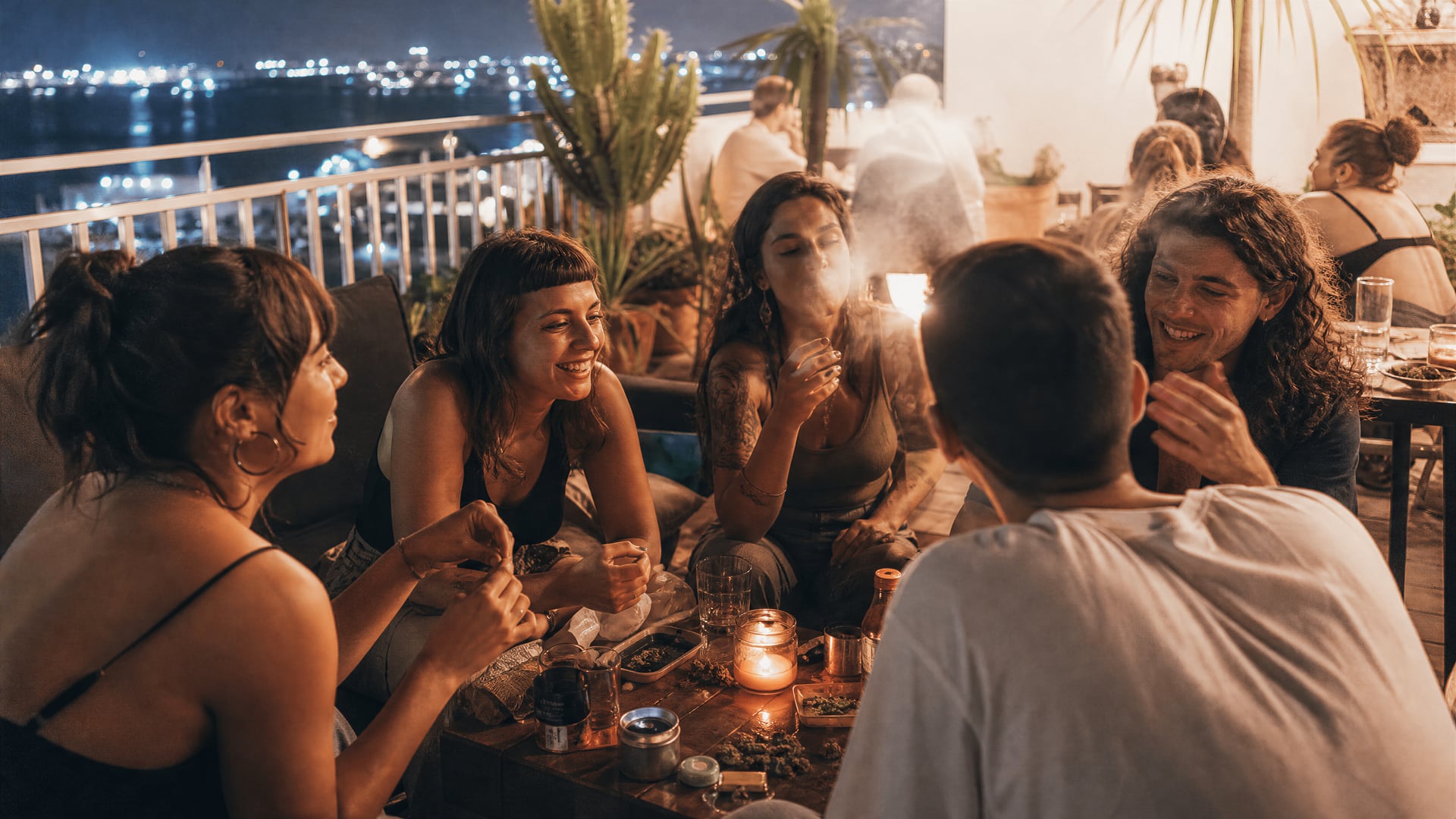 Alicante night terrace with friends beside the cannabis social club evening scene