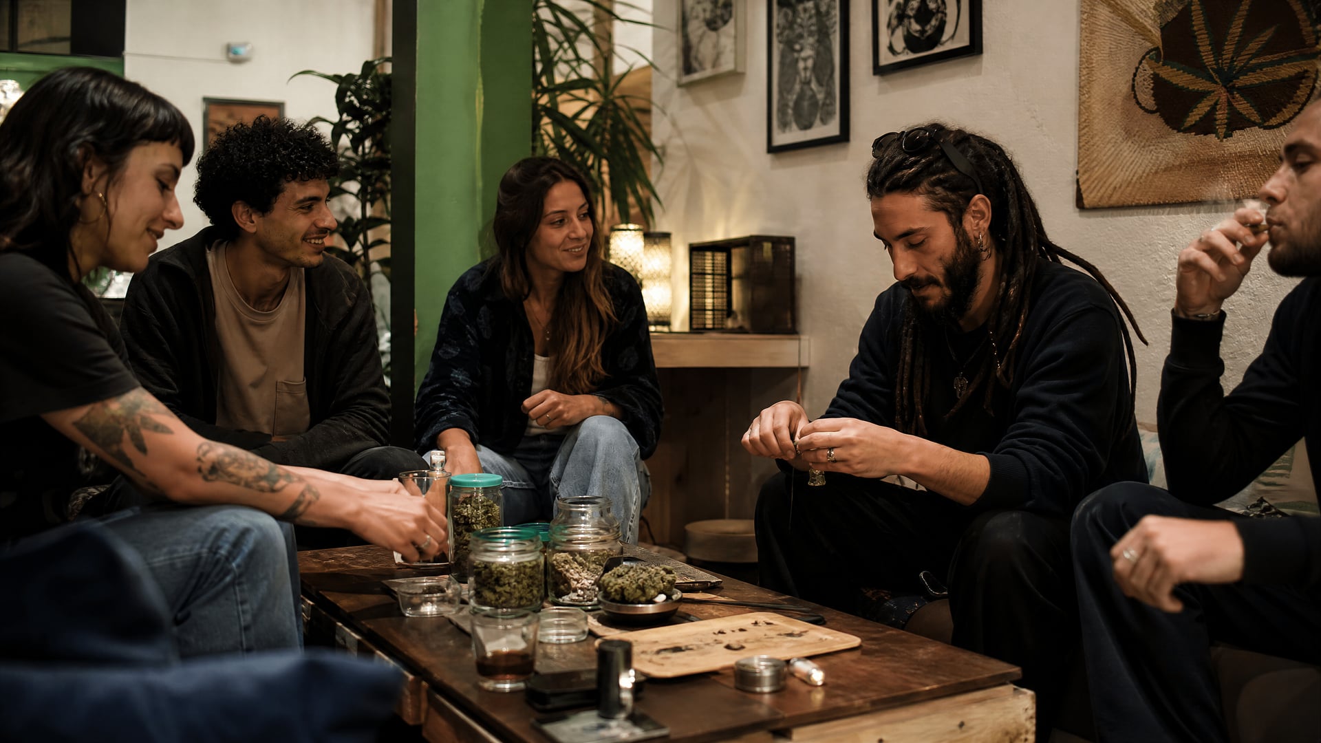 Seville cannabis social club reception with membership papers and adults-only setting