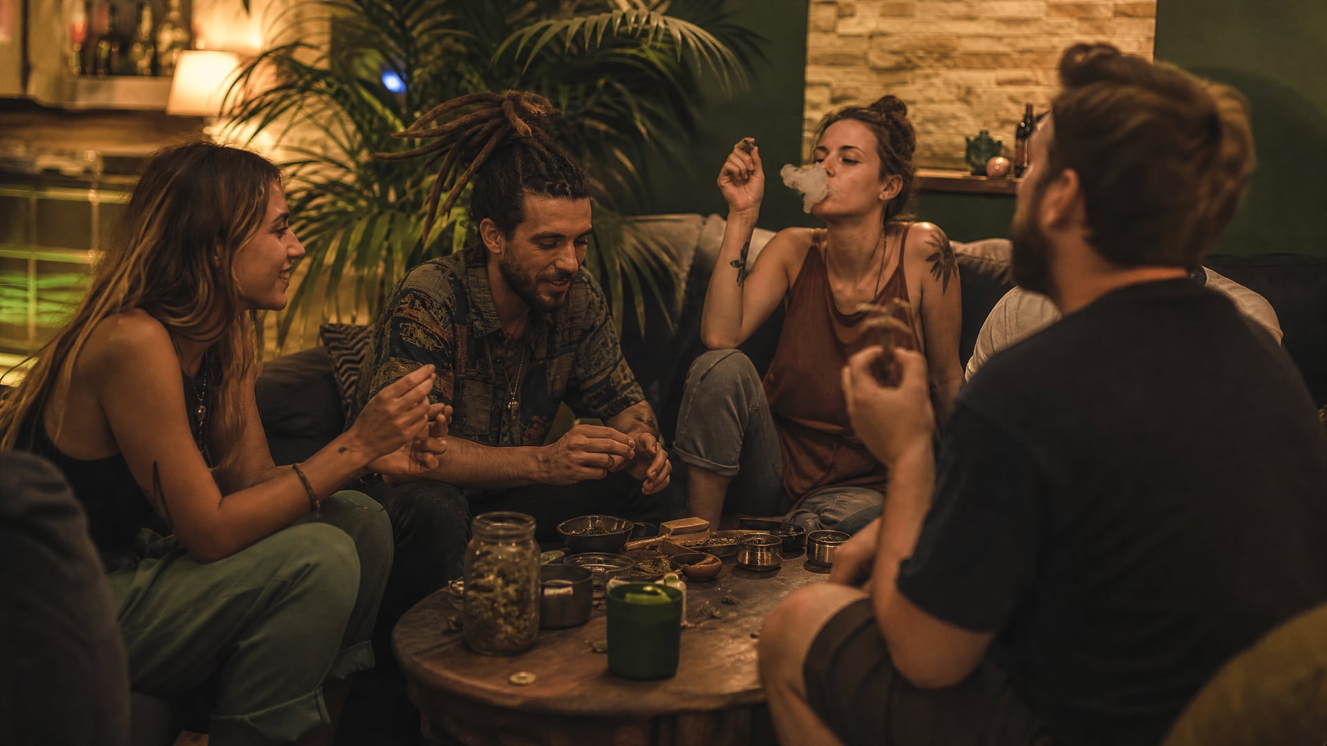 Members-only Llucmajor cannabis social club lounge with sofas and low evening lighting