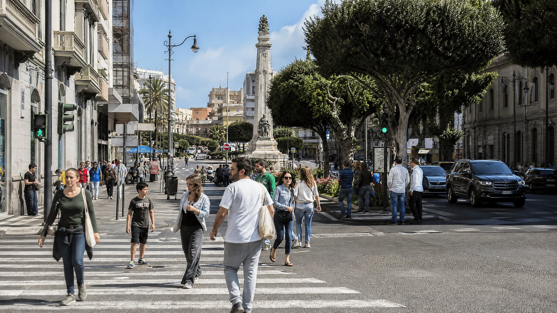 Santa Cruz de Tenerife street crossing with daily city movement and club context