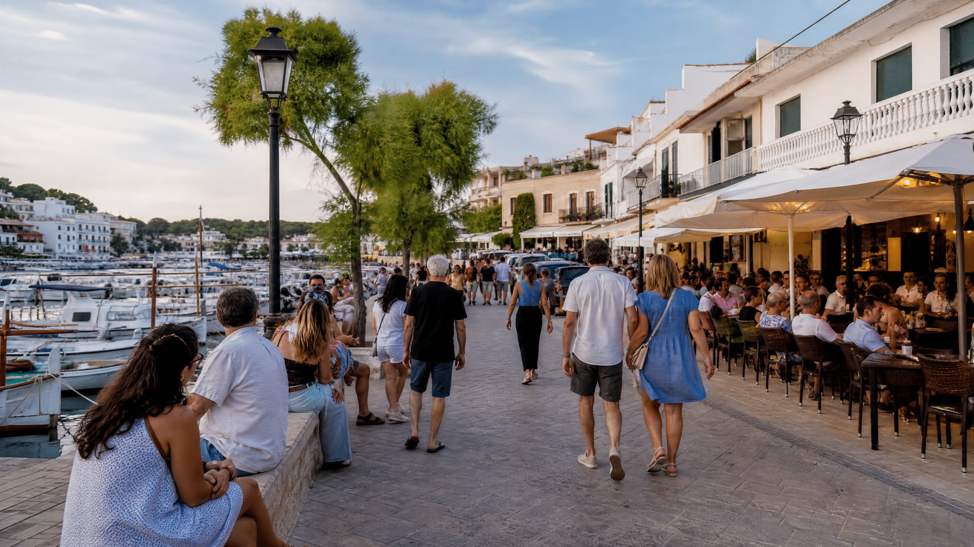 Porto Cristo streets by the marina with local traffic and seaside movement