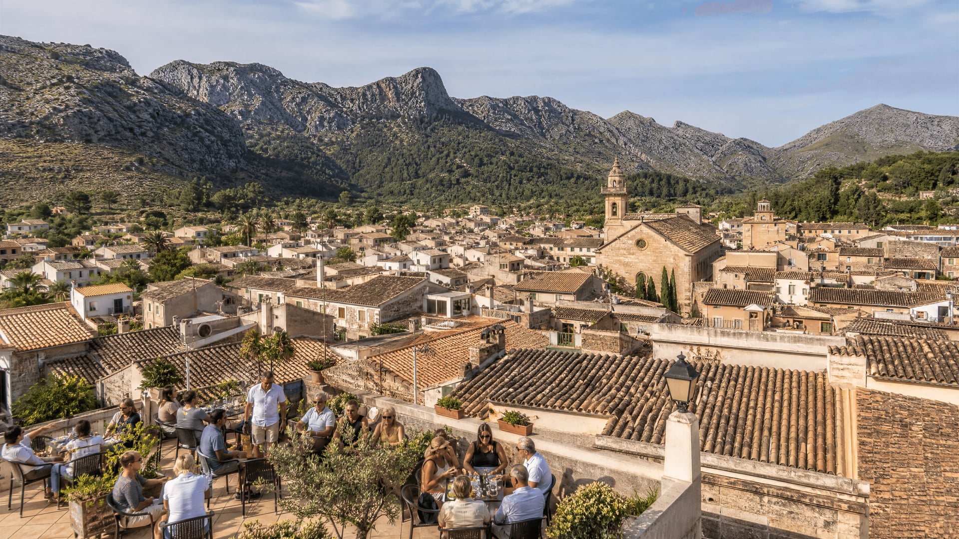 Pollença skyline over the old town with cannabis social club directory context