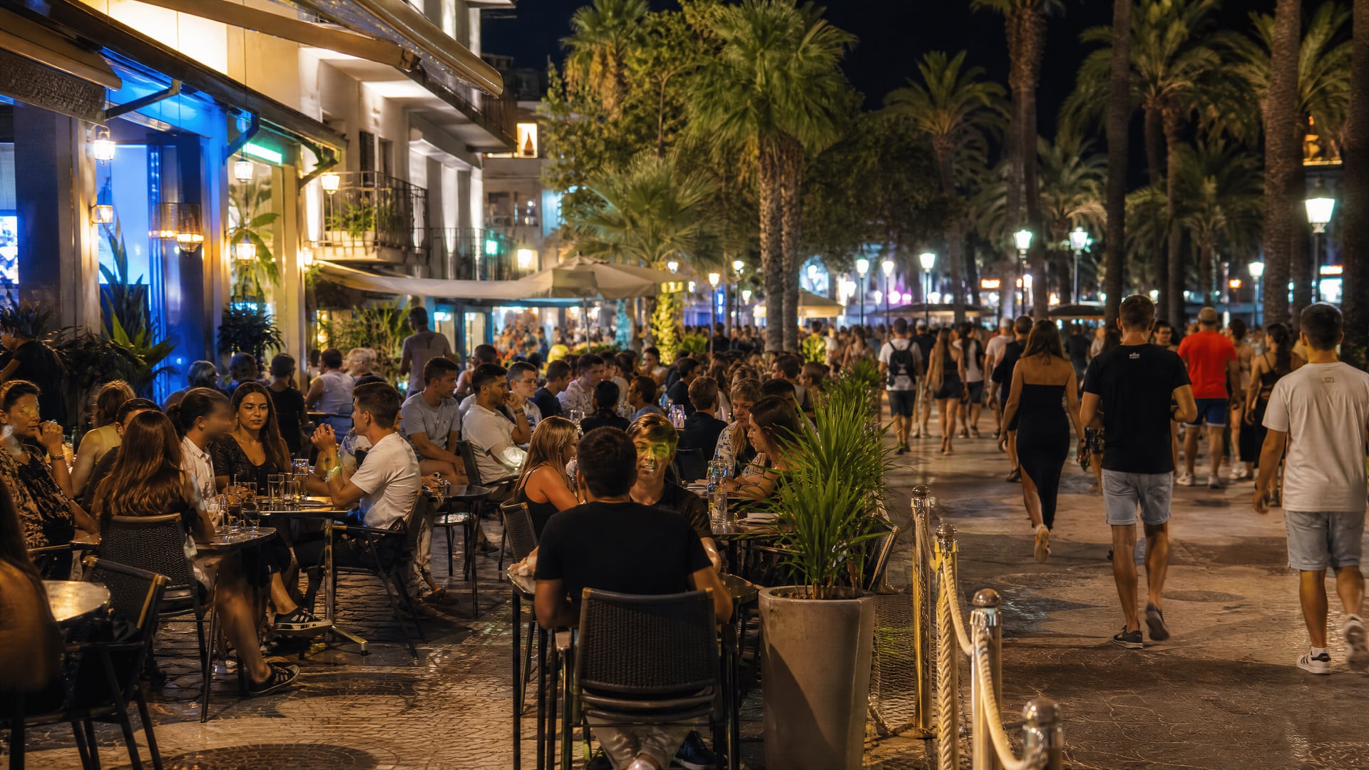 Lloret de Mar nightlife street with terrace seating near club districts