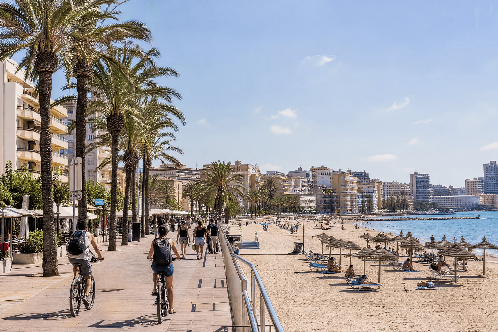 El Arenal waterfront promenade with local life and cannabis social club context
