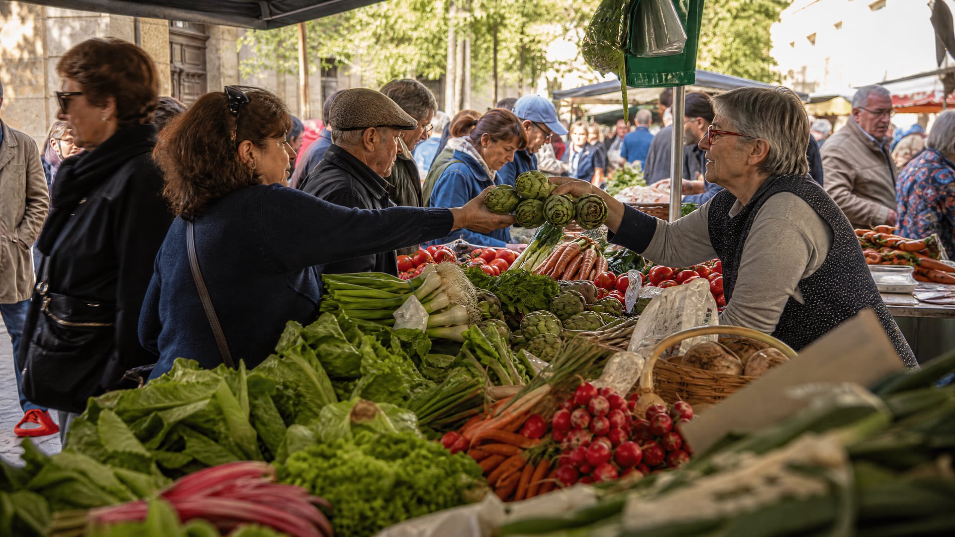 Bustling Catalonia market day with local food culture and club neighborhood life